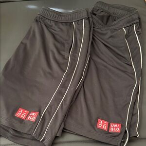 UNIQLO Black Athletic Shorts with White Piping and Red Logo